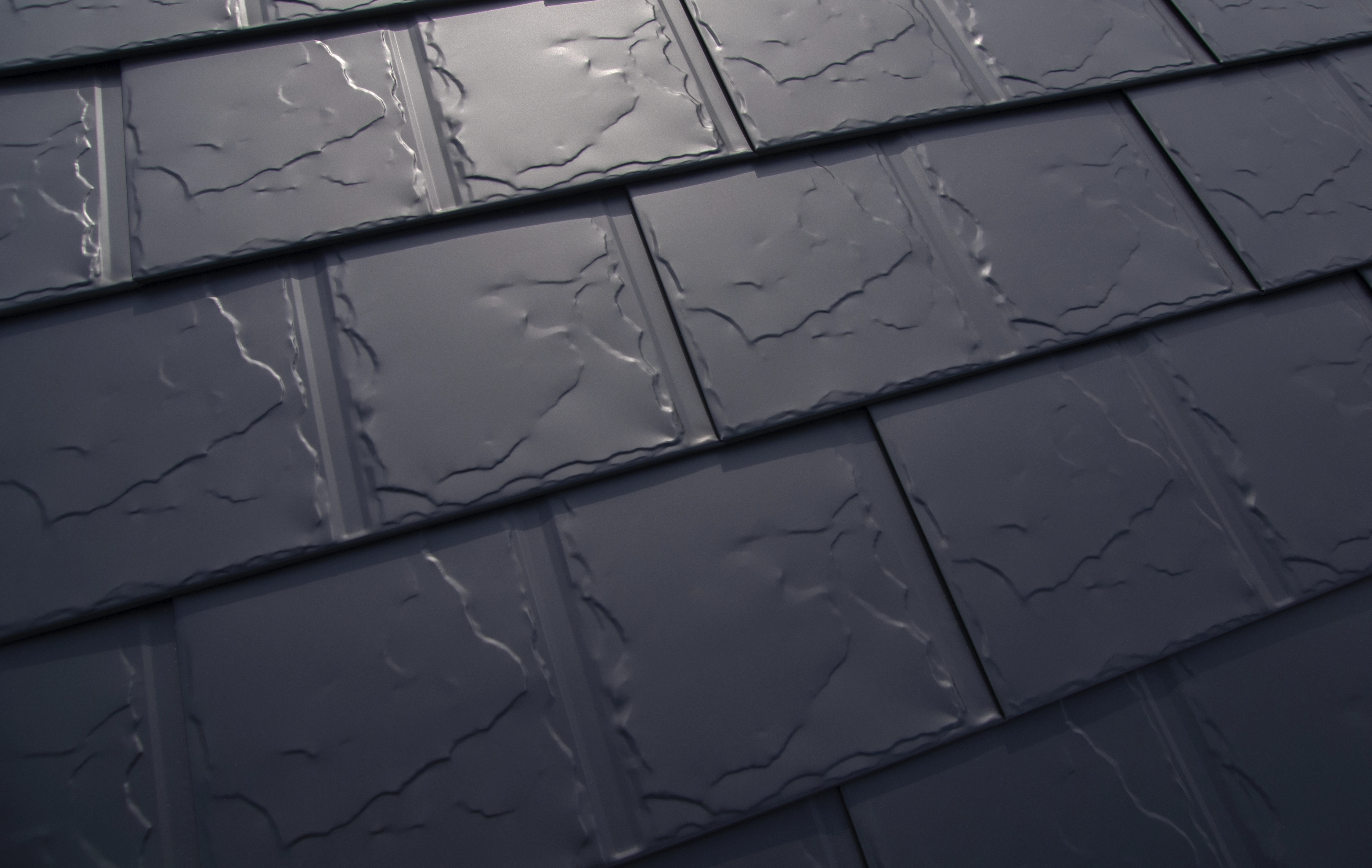 Close-up of Deep Charcoal Interlock aluminum slate roofing